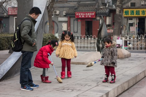 Jugando en las calles de Beijing